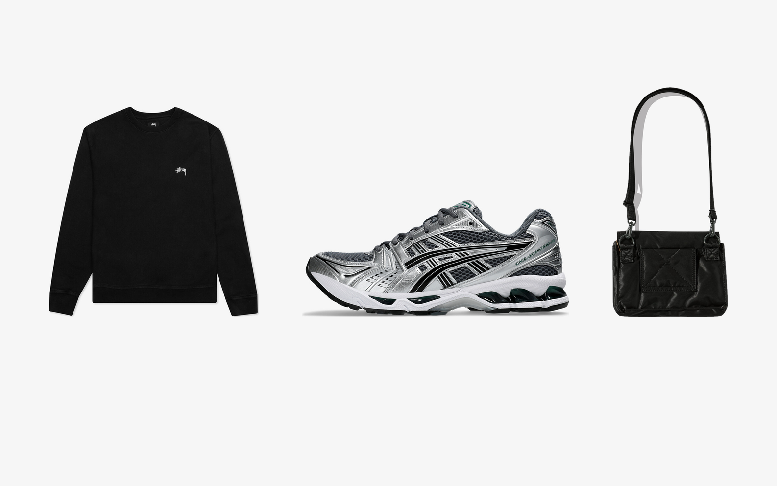 Тёмно-синяя рубашка-куртка Stone Island, молочное худи Carhartt WIP и коробка New Balance на стальной витрине